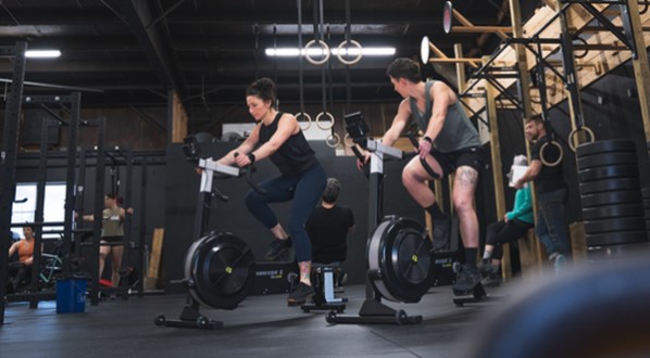 women on bikeergs