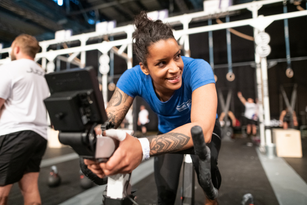 smiling woman on bikeerg