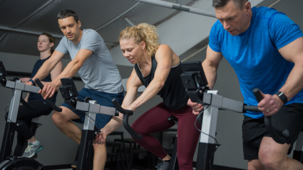 men and woman on bikeerg   