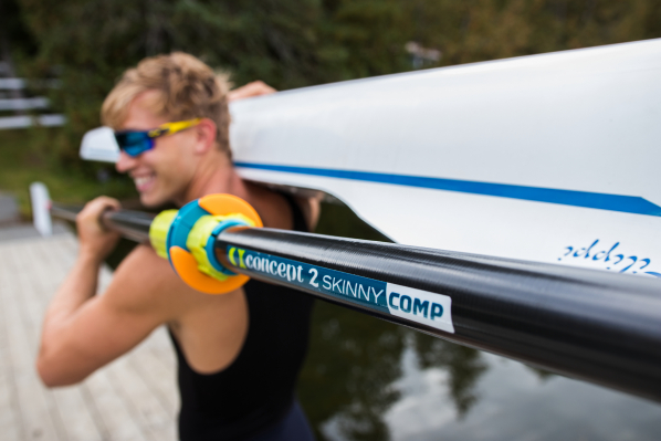 guy with oar and boat